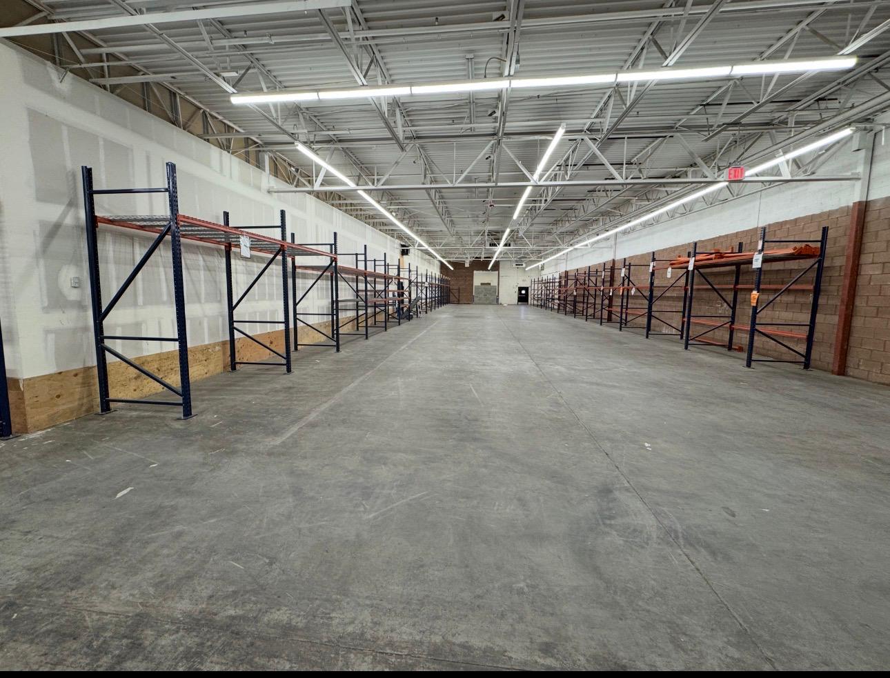 Forklifts on trailer during Fortune 500 retail liquidation